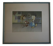 ''Pinocchio'' Animation Cels by Walt Disney of Pinocchio & The Little Dutch Girl Marionette -- With Courvoisier Label